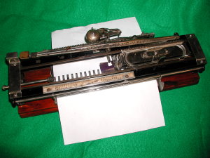 Alexis typewriter with paper inserted